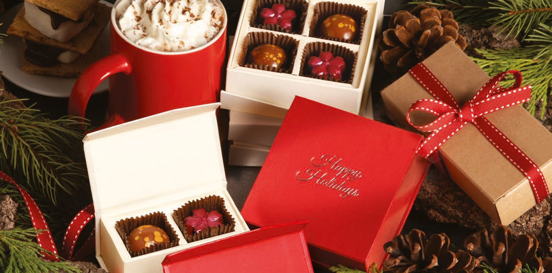 Elegant Torn Ranch gourmet gift tower with artisan chocolates, nuts, and truffles from the 2025 luxury corporate gifting collection.